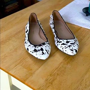 Women’s cow print flats